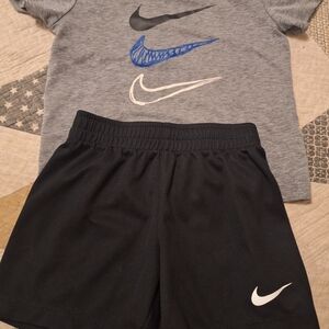 Nike Boys Black Athletic Mesh Shorts with White Swoosh